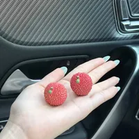 车载荔枝摆件是‘吉祥物’还是‘安全刺客’？全网用户观点大PK