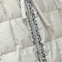 新中式羽绒服：轻盈暖意，优雅随身