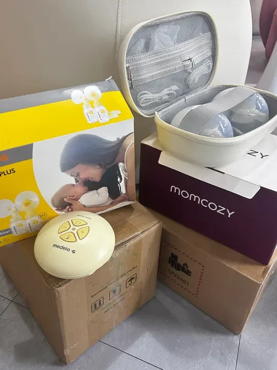 急急急二选一!!留美德乐还是Momcozy啊?