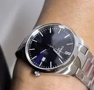 天梭PR100间金款：低调奢华之选