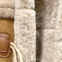 冬季时尚穿搭指南：那件让我温暖又时髦的皮毛一体外套