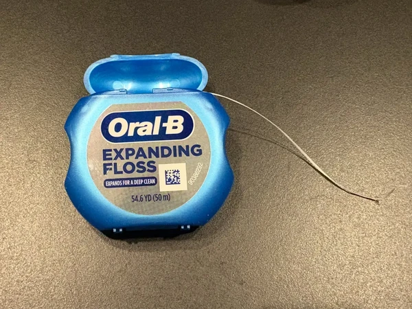 欧乐B和Dr Tung's膨胀牙线对比