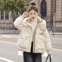 2025冬季新款：丝柏舍推出撞色羽绒服，时尚百搭！