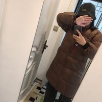 冬季旅行怎么穿好看不冻人 ，冬季鹅绒羽绒服蓬松轻便保暖舒适