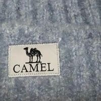 骆驼奶芙帽：冬日氛围与实用主义的结合