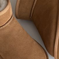 东北冬日穿搭：雪地靴与羽绒服