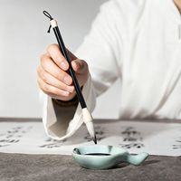 初学者练字该选毛笔还是硬笔？书法入门工具之争引热议