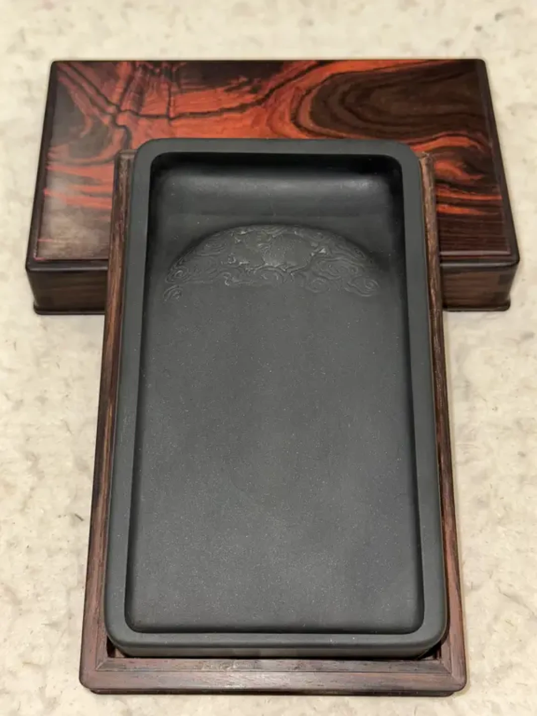 我若打开这个砚盒,阁下该如何应对!
