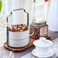 别被“低糖”“无添加”迷惑！选年货坚果糕点糖果，看准配料表首位与独立包装才靠谱