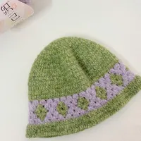 钩织 |💜💚菱格纹渔夫帽   视频教程 🧶：织己手编线  泡芙 颜色是08芋泥紫薯07青芽麦浪，适合56-58左右头围
🪡：4.0
📖:@口折文手作 感谢分享
#我的手工作品 #手工 #钩织图解 #钩针教程 #钩织教程