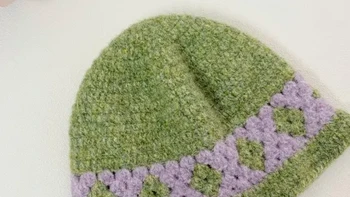 钩织 |💜💚菱格纹渔夫帽   视频教程 🧶：织己手编线  泡芙 颜色是08芋泥紫薯07青芽麦浪，适合56-58左右头围
🪡：4.0
📖:@口折文手作 感谢分享
#我的手工作品 #手工 #钩织图解 #钩针教程 #钩织教程