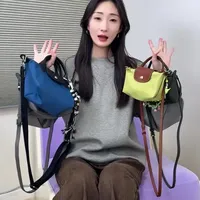 珑骧 mini包全对比：选对你的“轻盈全能
拍档”#珑骧mini饺子包 #买包包 #包包