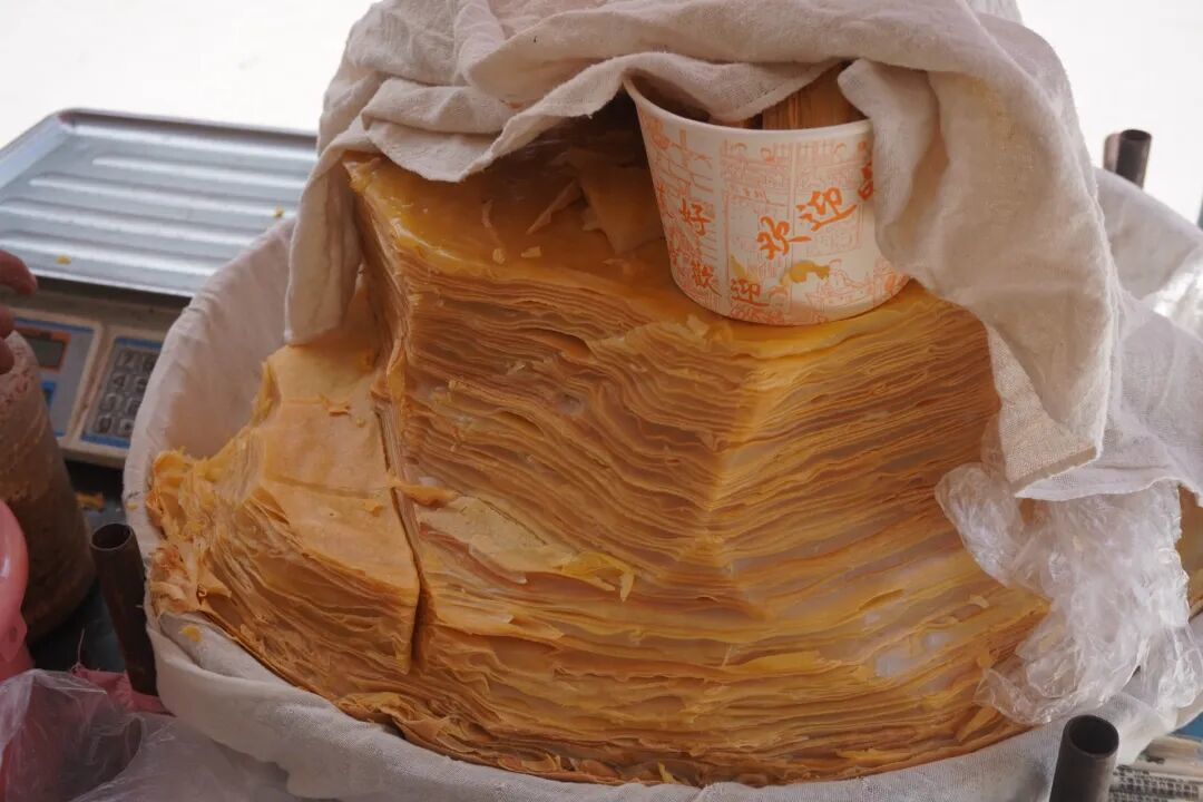 舌尖上的云南|南涧油粉,是名副其实的锅巴千层