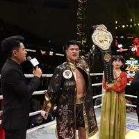 一夜封王！徐元庆勇夺世界金腰带，铸就中国搏击里程碑