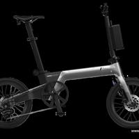 8000元碳纤维电助力折叠车值不值？轻量化登机与智能互联成关键分水岭