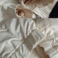 羽绒服根本不用水洗，一块毛巾，一个小刷子，轻轻松松把污渍祛掉，你也可以试一下