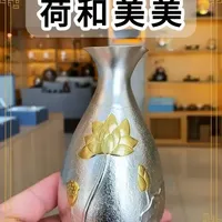 用足银打造出来的镀金荷花烫酒壶，寓意“荷和美美