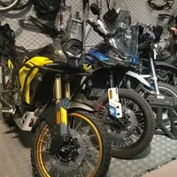 无极DS800X与春风800MTX骑行姿态与硬件配置深度对比