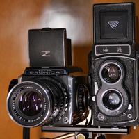 限制中画幅普及的原因除了价格还有什么？