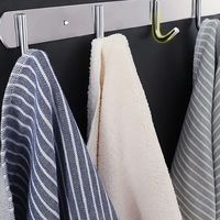 免打孔置物架真能扛住浴室潮湿？实测揭穿“无痕”谎言：选错类型三个月就掉