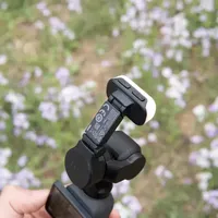 大疆 OSMO Pocket 4 深度体验：三年之后，大疆如何继续定义「手持云台相机」