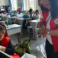 公主岭市青年先锋志愿者协会妇女联合会:书香润童心,巾帼暖校园