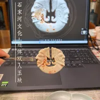 手搓石家河文化连体双人玉玦冰箱贴