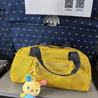 看看大家出差都带什么随身包