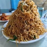 周口老式炒面条的焦糊争议:特色工艺还是操作失误?