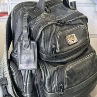 用了十年的TUMI背烂了，却没人舍得扔：翻遍全网修补经验和退休信号，给你三条路