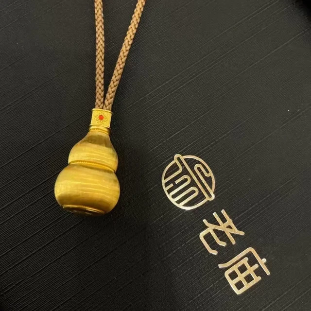 金价一周跌104元，金店忙着关店：老庙的中报里，藏着下半年买金的真相