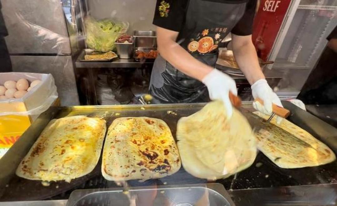 粥饼伦天津新店开启试营业,降至8元一套引市民排长龙