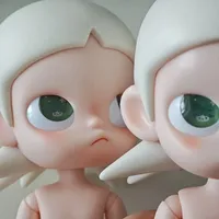 周年庆中签的嘎子姐到货，“差点以为是假货”：脸发黄、额头黑点要不要换？先看这15个月品控实录和460元二手行情