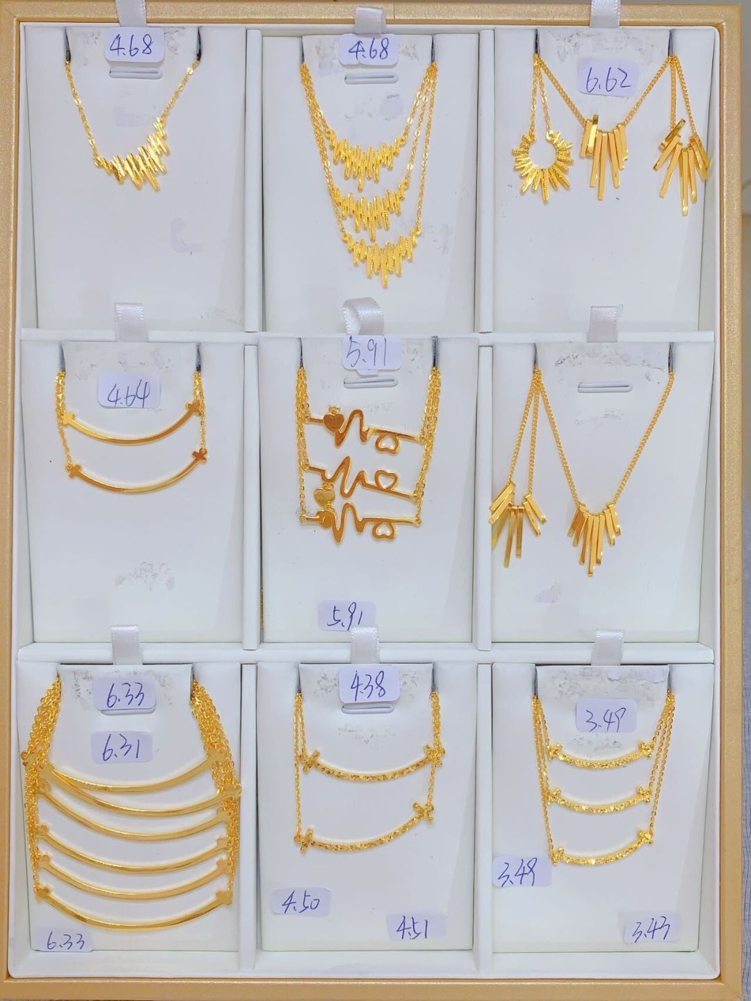 品牌金饰一夜跌掉约30元/克,“抄底”还是“再等等”吵翻了:七夕前最后一个周末,金该怎么买