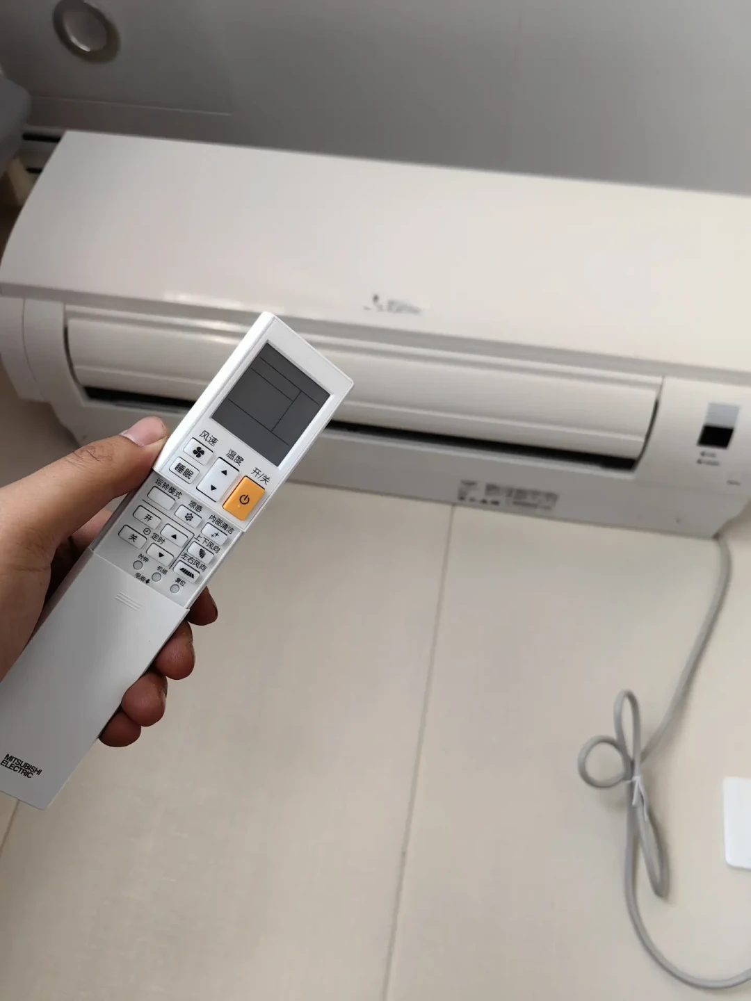 三菱电机空调终于接上鸿蒙了：新机30秒配网、iPhone也能用——但老机器没有官方路线，先看清再高兴
