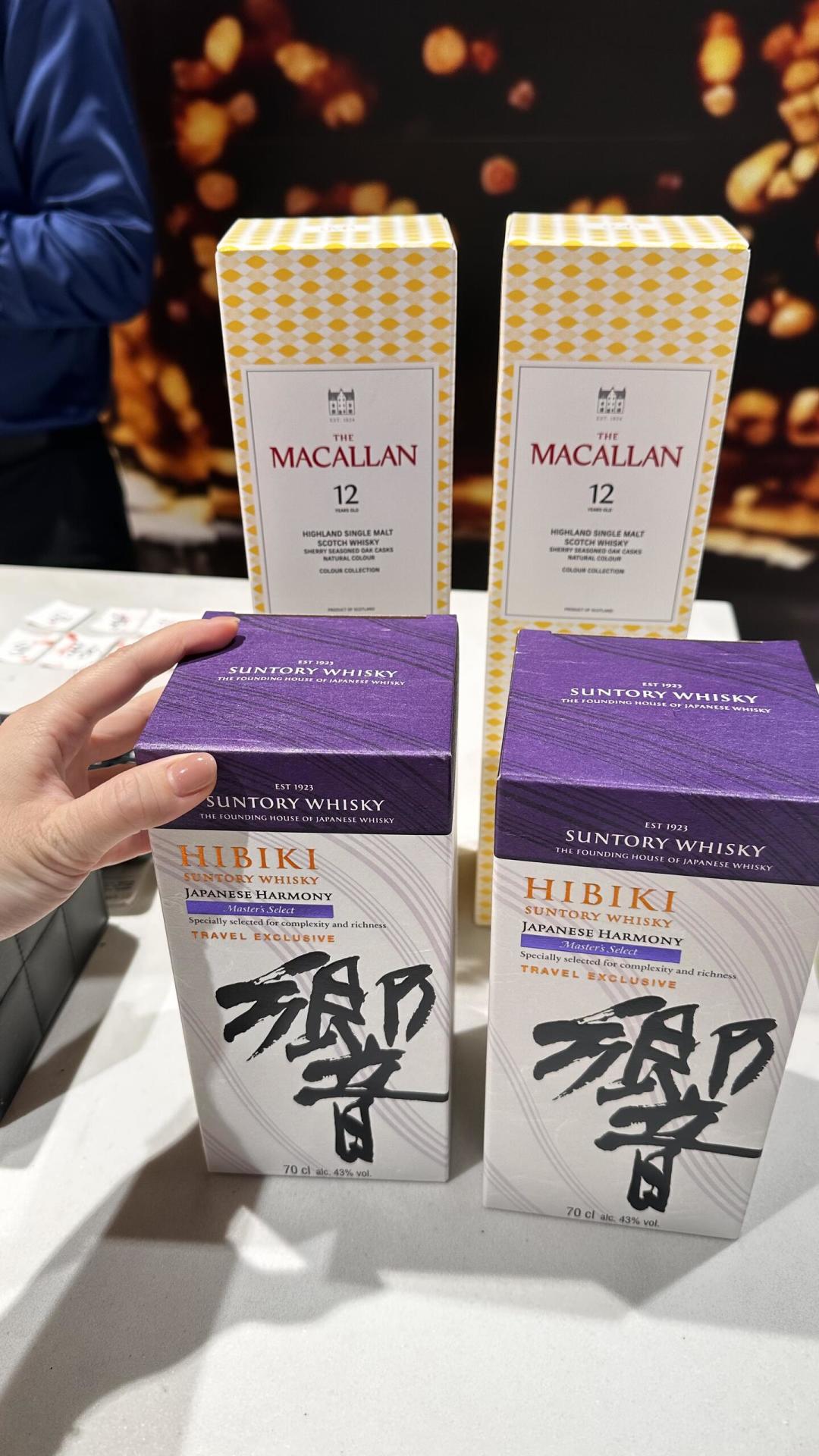 威士忌在线上跌疯了,海口免税酒墙前还在挤人:算完账我发现,免税只在这三种情况下值得买