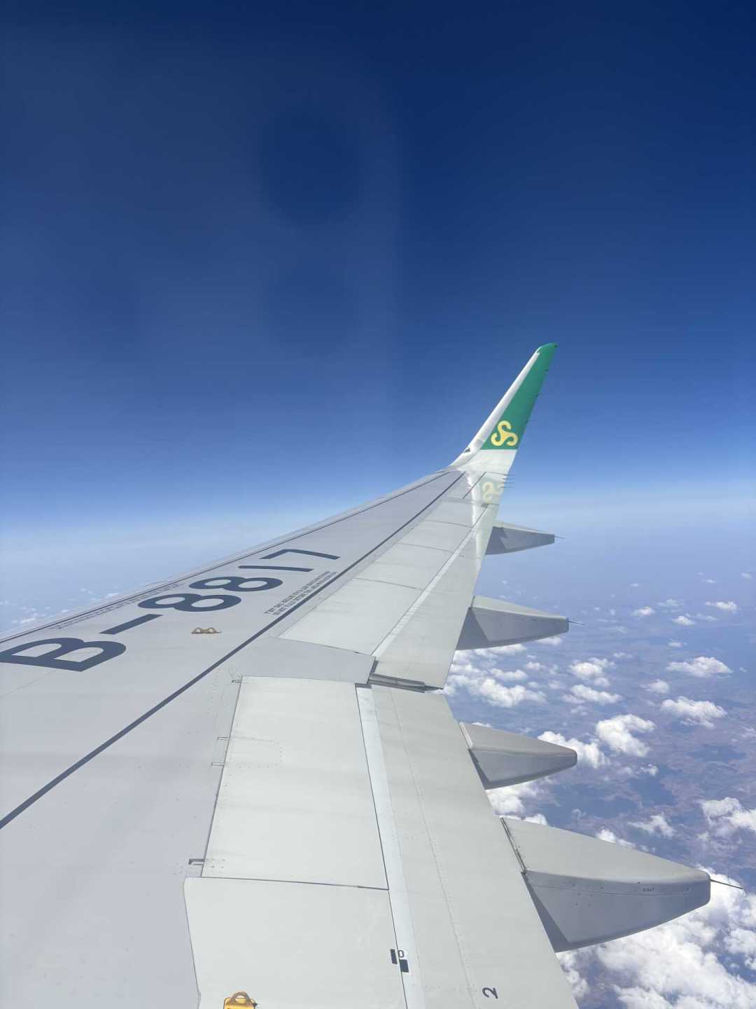 燃油费三连降、十天两次道歉:2026年坐春秋航空,到底要花多少钱?