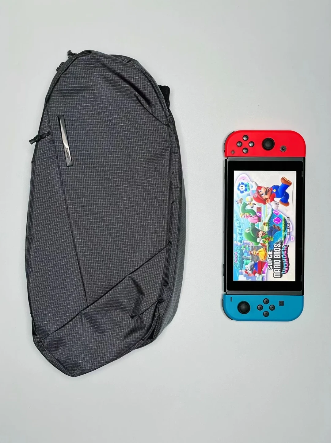 Switch 2 带壳装不进普通小包?翻完 NIID N1L 的全部实测,说说这只「加长」小包适合谁