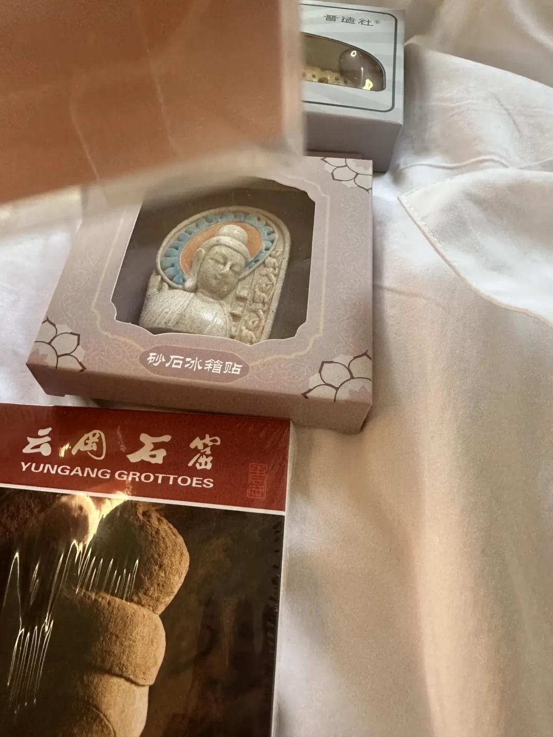 刀削面冰箱贴上热搜却断货,佛小伴仿品只卖13块:去云冈买文创前先看这篇
