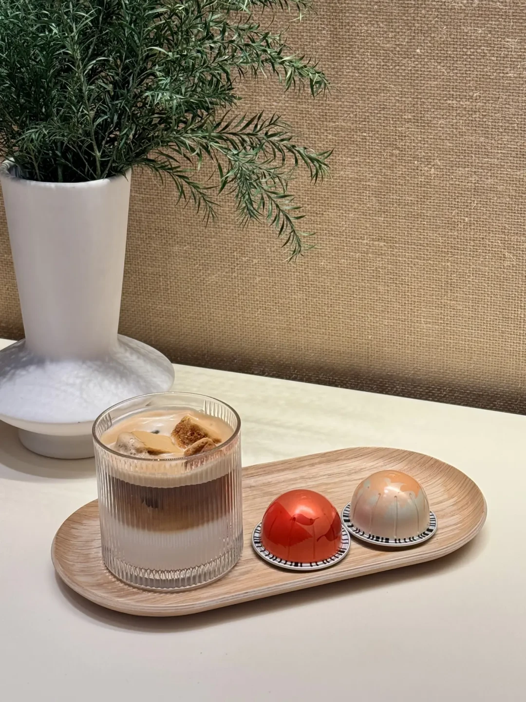 「一颗胶囊=577元/公斤」?门店9.9在退潮、绿豆价在倒挂:奈斯派索的一杯账,2026年8月得重算
