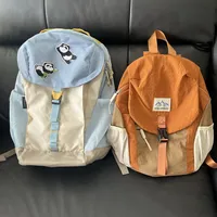 医生都说护脊书包不是智商税，娃却背着它哭：开学季我把迪卡侬书包帖和知乎测评翻了个对穿，便宜包和贵包三笔账一次算清