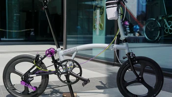 小布的“齿比账”：一张速度对照表、三个错题、一个轮径错觉和三类人的路线