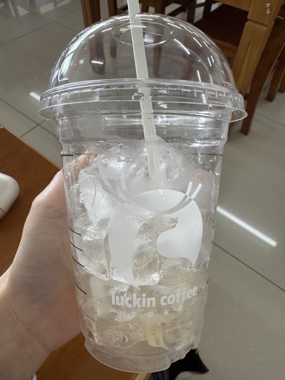 杯身印的596ml是