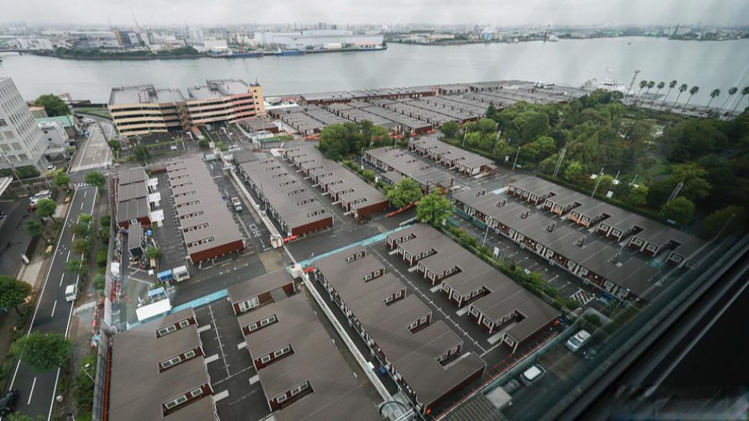 日本亚运会住集装箱遭吐槽：预算飙升近三倍背后的办赛困局