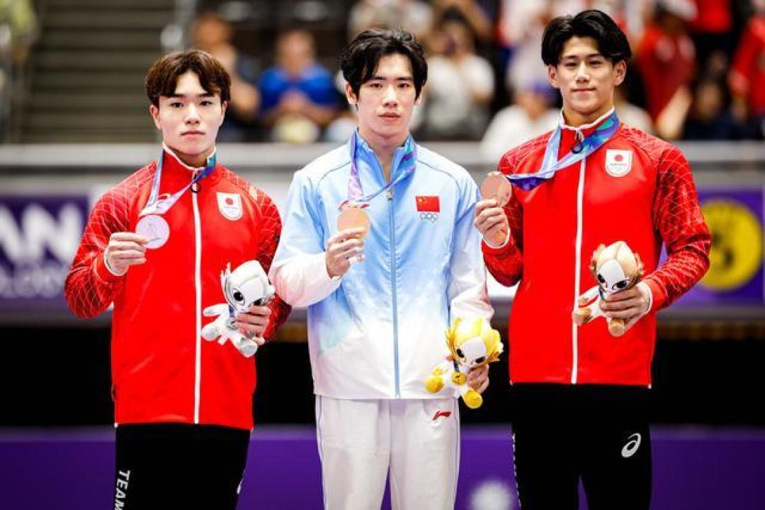张博恒带伤力克日本名将，卫冕亚运会体操男子个人全能金牌