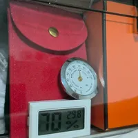 防尘袋比包先霉：翻遍14篇换季收纳翻车帖，才懂保包关键是那个压不下来的湿度数