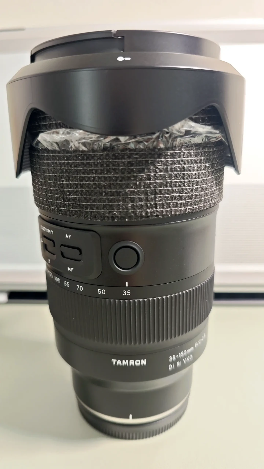Z5II用户今早发帖问的,正是35-150最纠结的事:二手跌进8k档,重量、进灰、转接、替代四笔账算完再出手