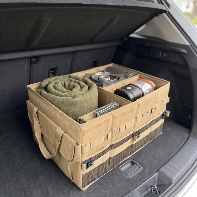 露营的第一次崩溃，发生在装车时：翻了974条评论的翻车帖和十几份爆款收纳清单——分区按场景别按品类，装车按倒序别按顺手，箱子等10月15日再决定买不买