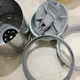 洗完衣服粘黑渣？洗衣机该泡还是该拆，看用了几年