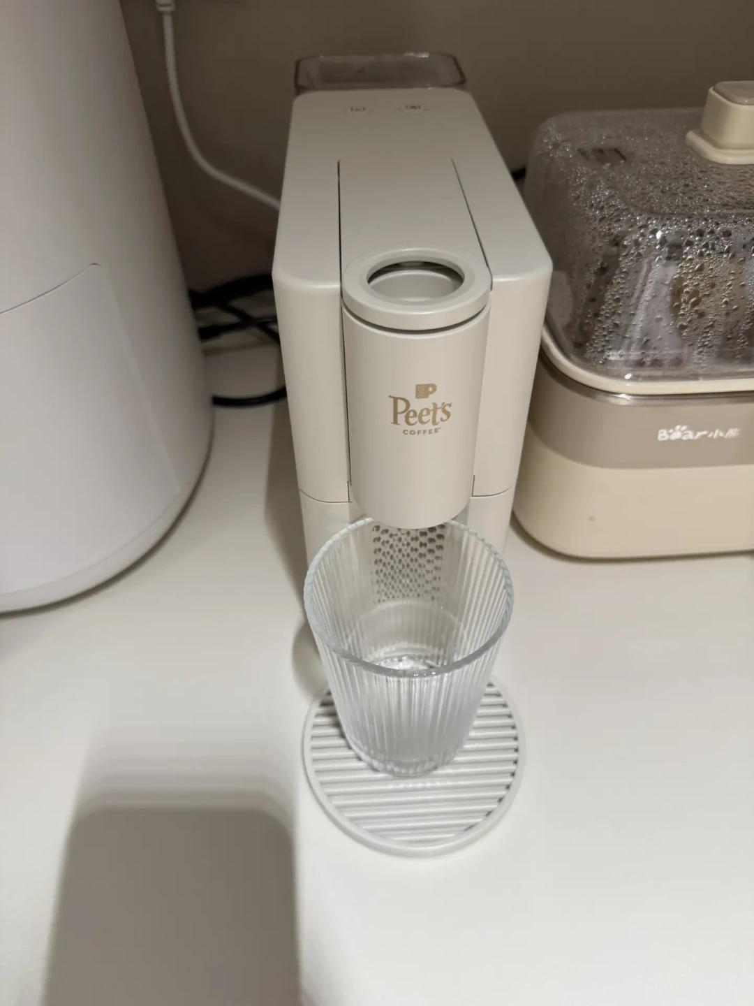咖啡液打到了1块2一杯:胶囊机主先别倒戈